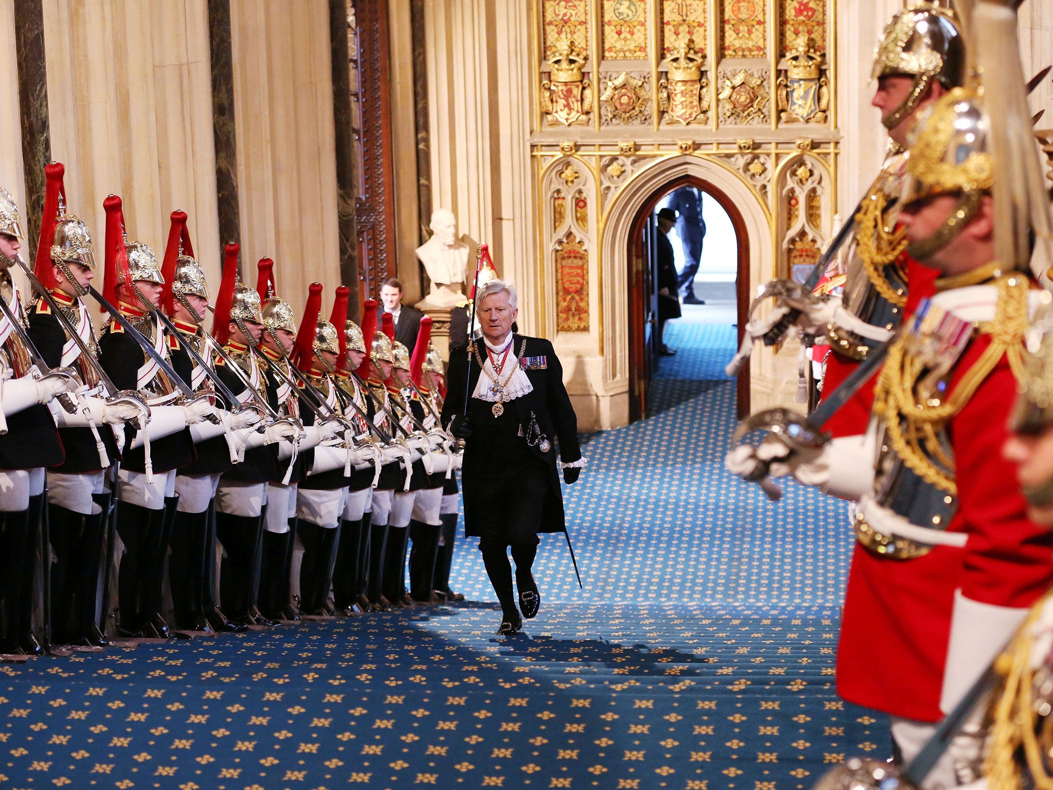 Black Rod approaches the House of Commons prior to the arrival of the Queen