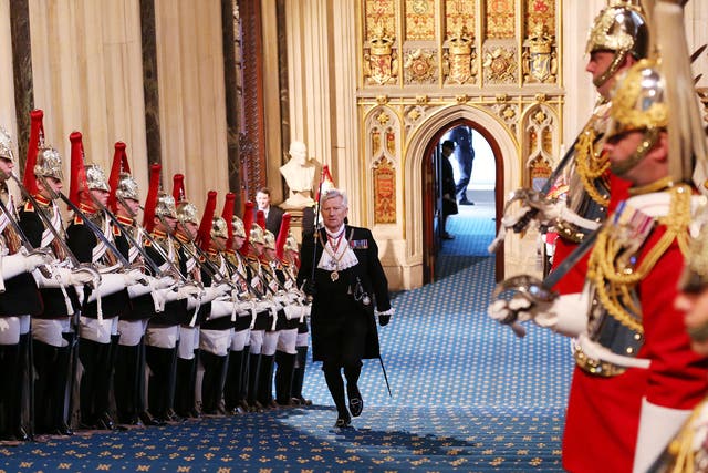 Black Rod approaches the House of Commons prior to the arrival of the Queen