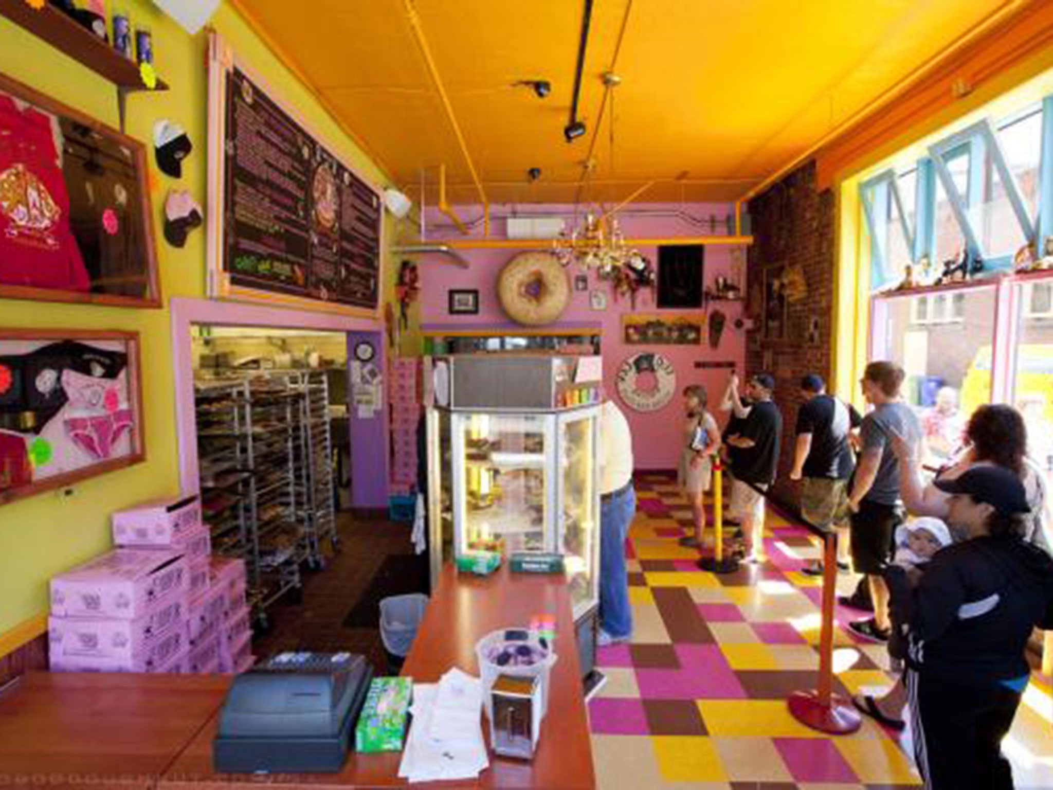 Voodoo Doughnut is famous for outlandish snacks including the Voodoo Doll Doughnut and the Maple Bacon Bar