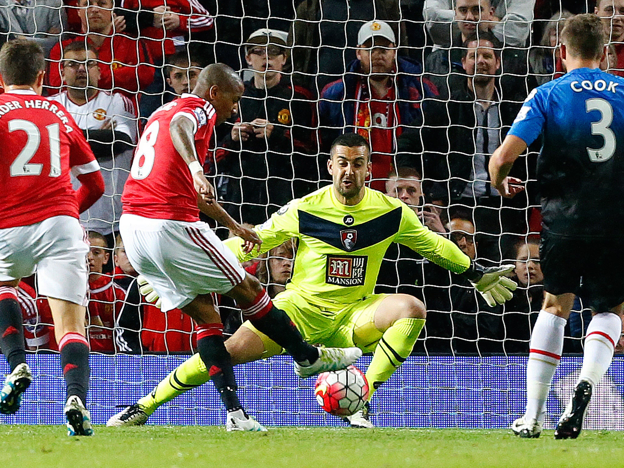 Ashley Young scores United's third after a fine pass from Wayne Rooney(Getty )