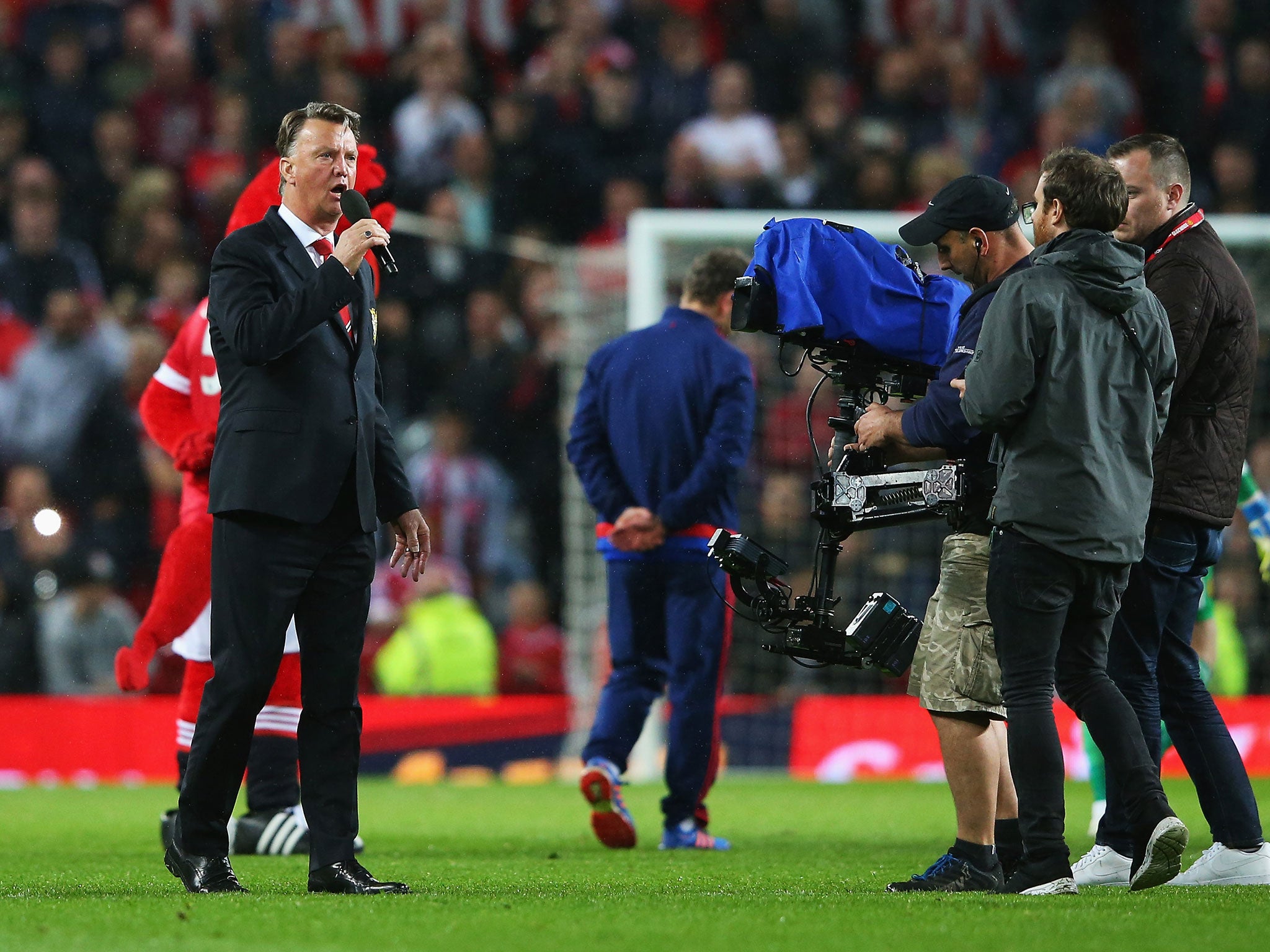 Louis van Gaal addresses the Old Trafford crowd after Manchester United's final game of the season