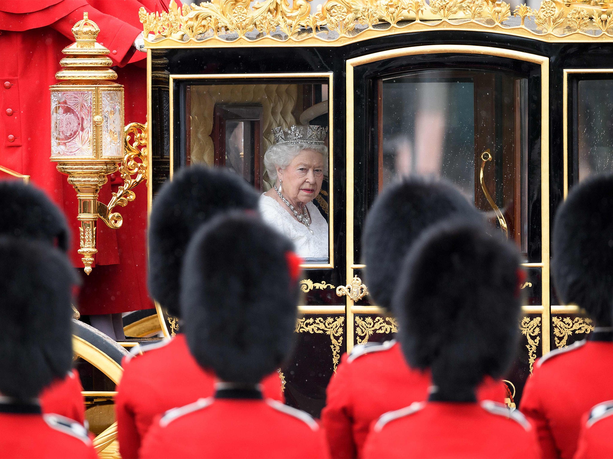 The Queen arrives to deliver her speech to Parliament, setting out the Government's legislative agenda