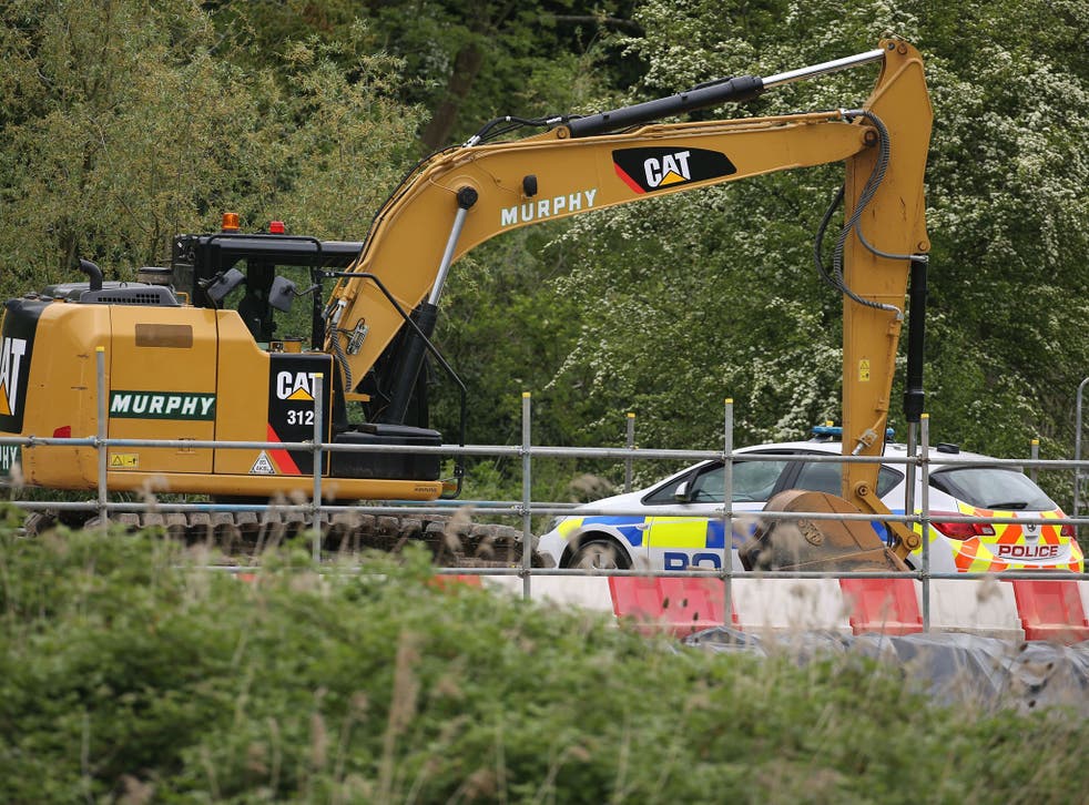 Police search for the remains of a body at construction site in Sharnbrook, Bedfordshire after a head was found in a quarry in Cambridgeshire.