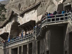 Read more

Tourism putting 4th century Silk Road cave paintings under threat