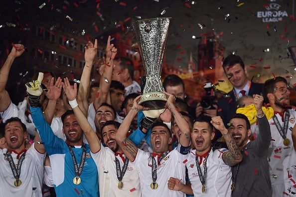 Sevilla lift the Europa League trophy for the third season in succession