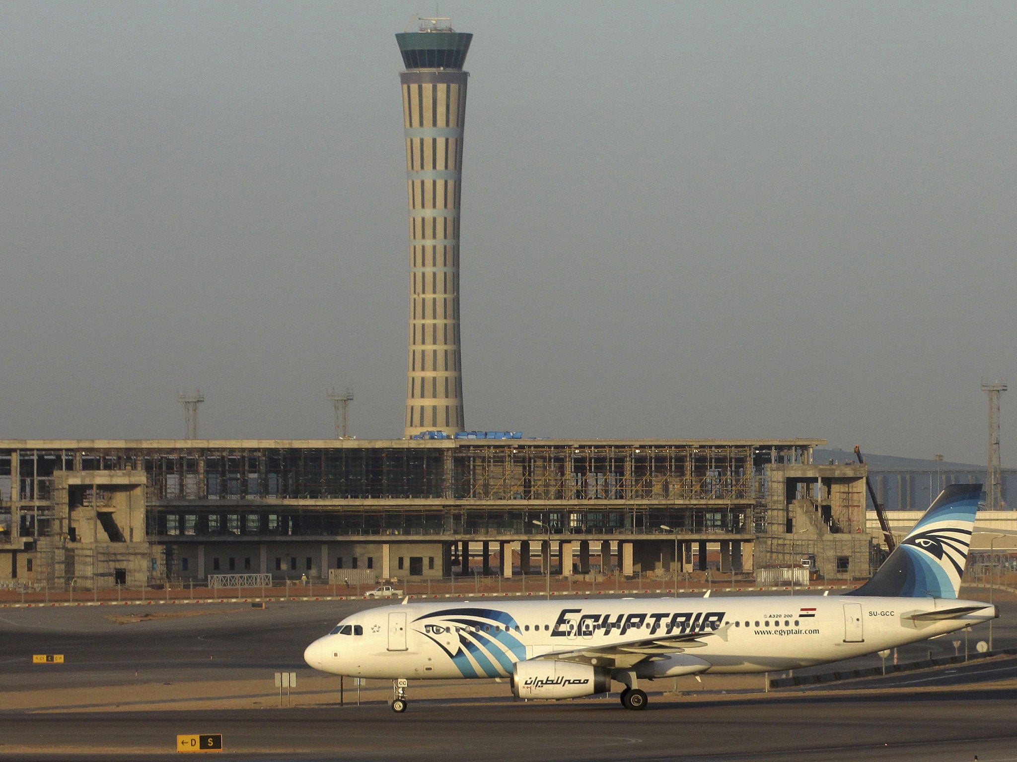 An EgyptAir Airbus A320 with the registration SU-GCC - the same as the missing jet - sits on the tarmac at Cairo airport, in file image from 10 December 2014