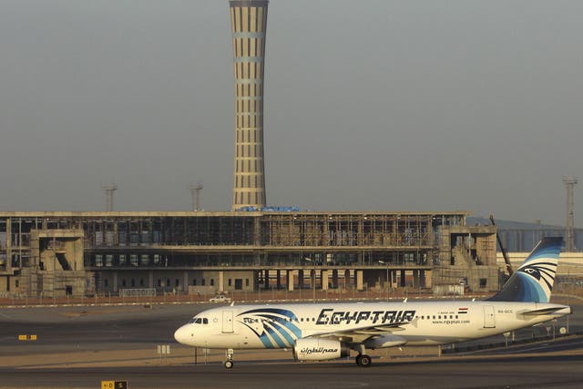 An EgyptAir Airbus A320 with the registration SU-GCC - the same as the missing jet - sits on the tarmac at Cairo airport, in file image from 10 December 2014