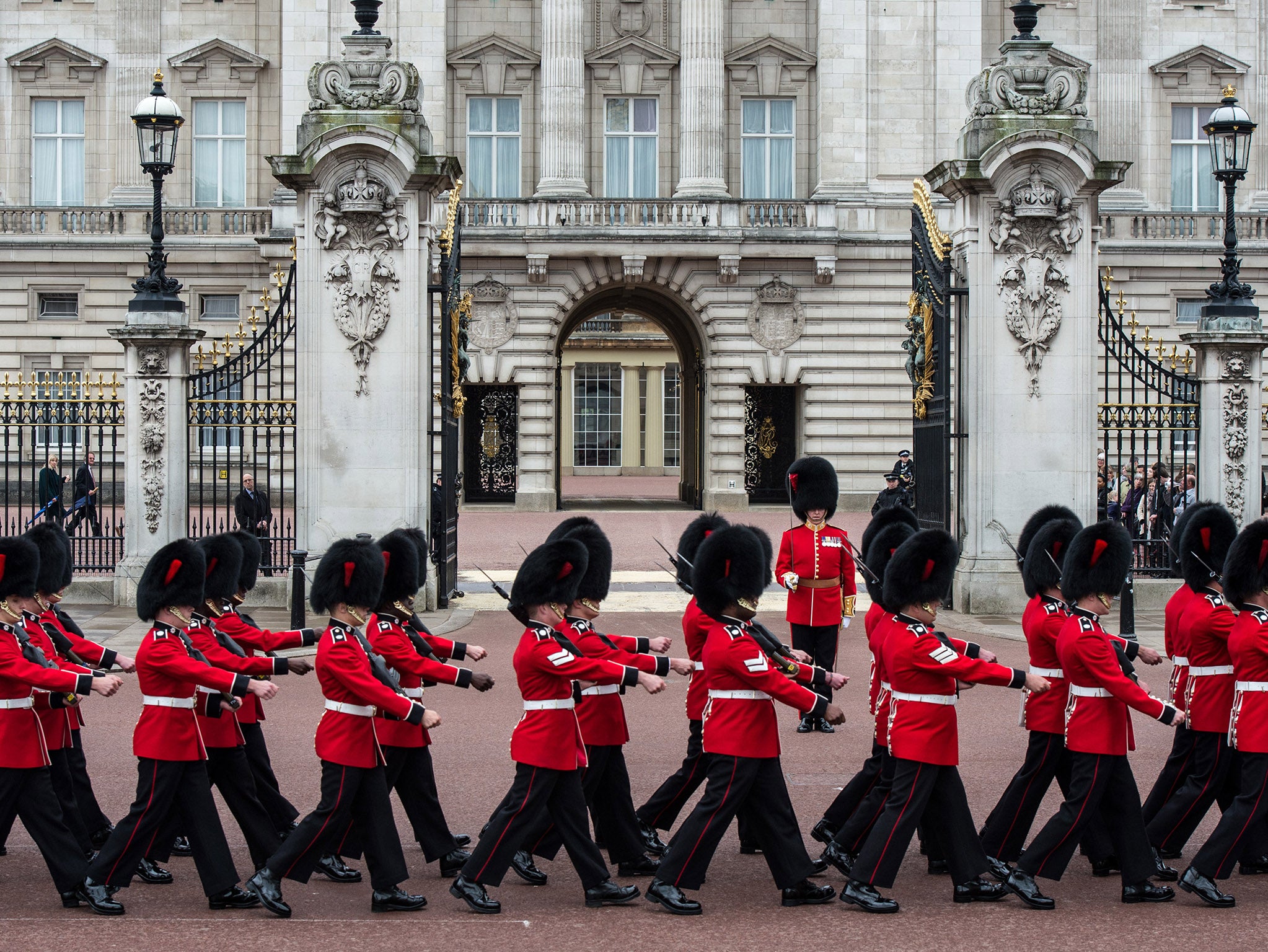 Queens guards march outside Buckingham Palace