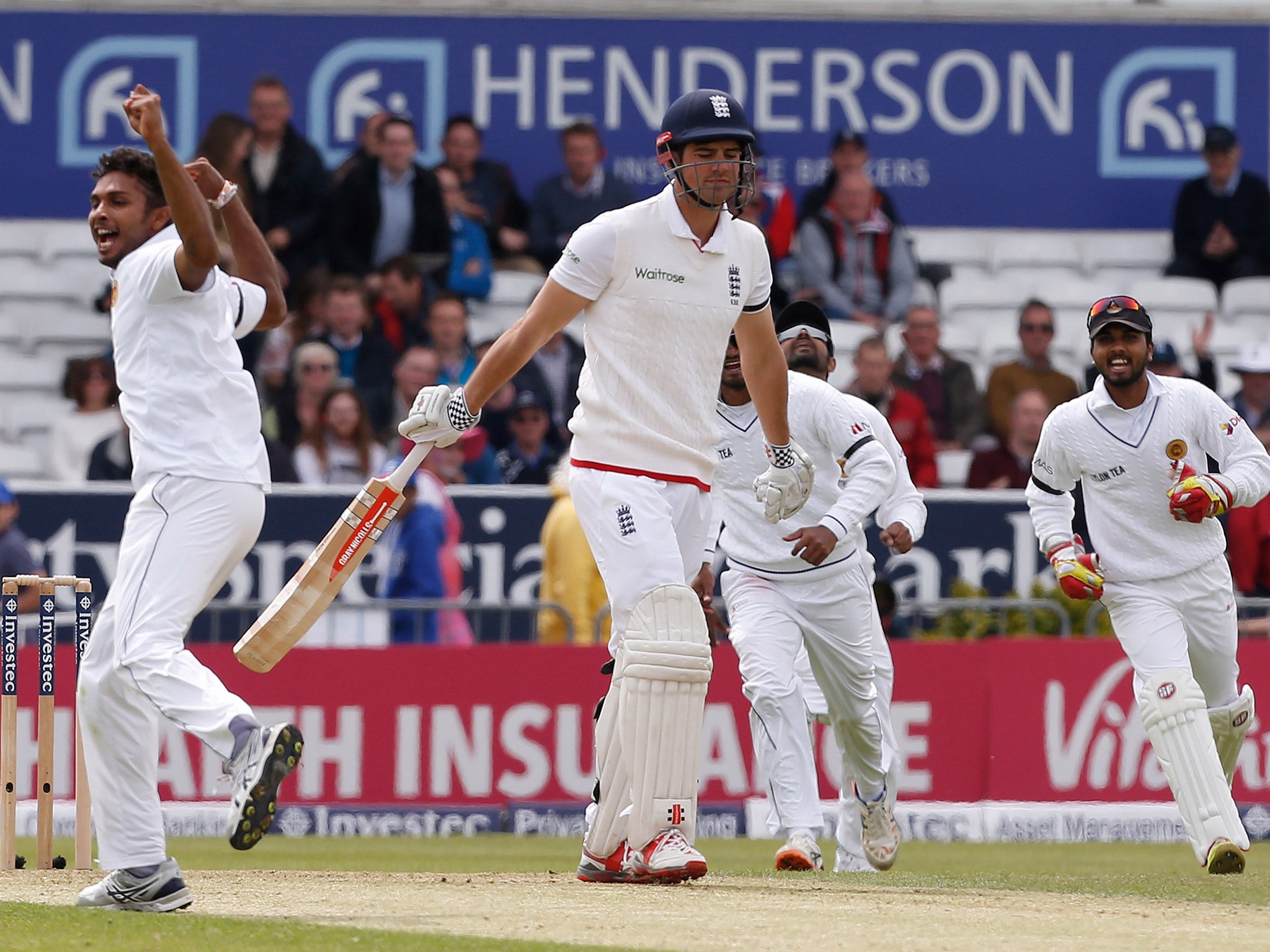 Alastair Cook reacts after being caught out off the bowling of Dasun Shanaka