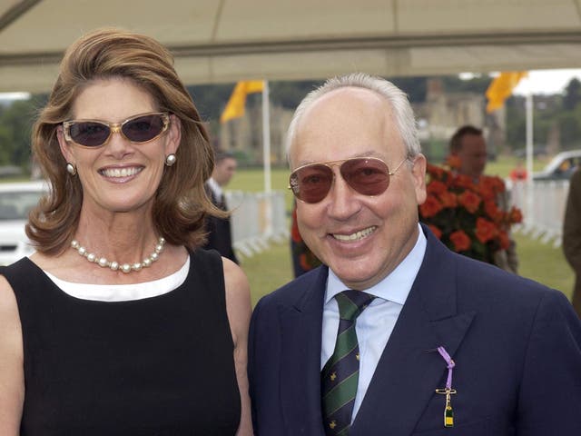 Urs Schwarzenbach, who owns a village in Buckinghamshire, with wife Francesca, a former Miss Australia