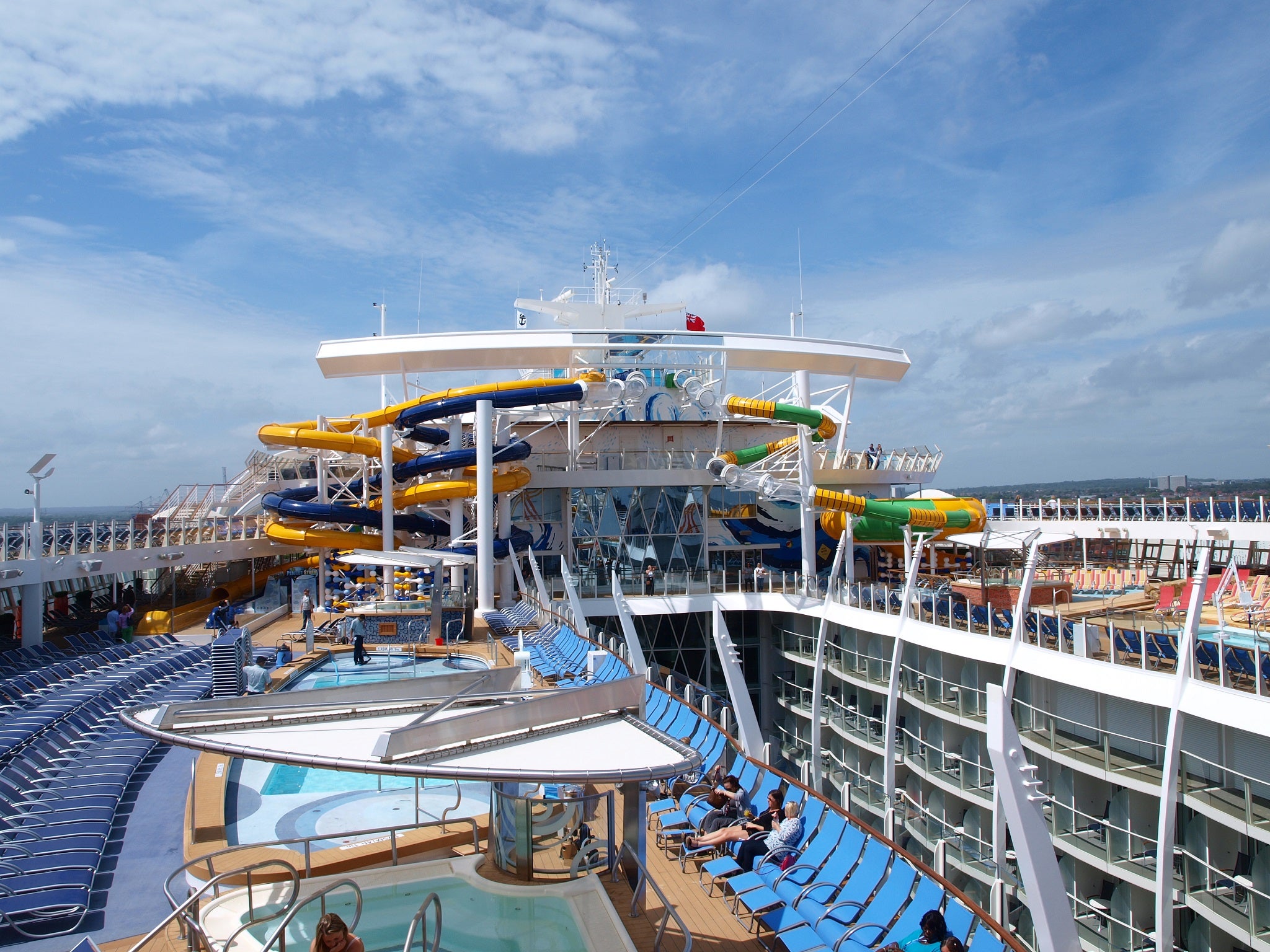 Sunloungers line the poolside on deck 15