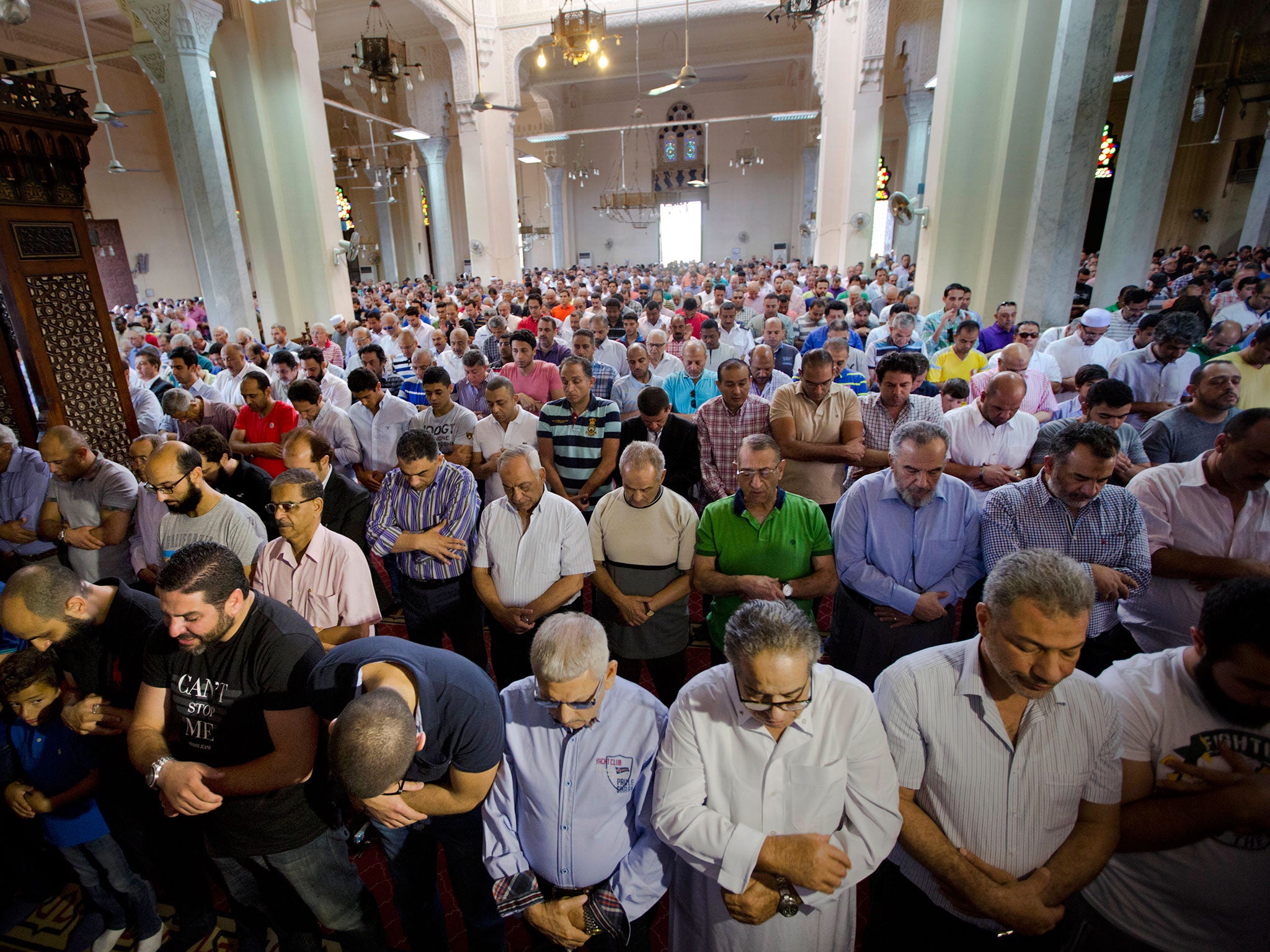 Egyptians perform prayers for the dead for victims of EgyptAir flight 804 at al Thawrah Mosque in Cairo, Egypt, Friday, May 20, 2016.