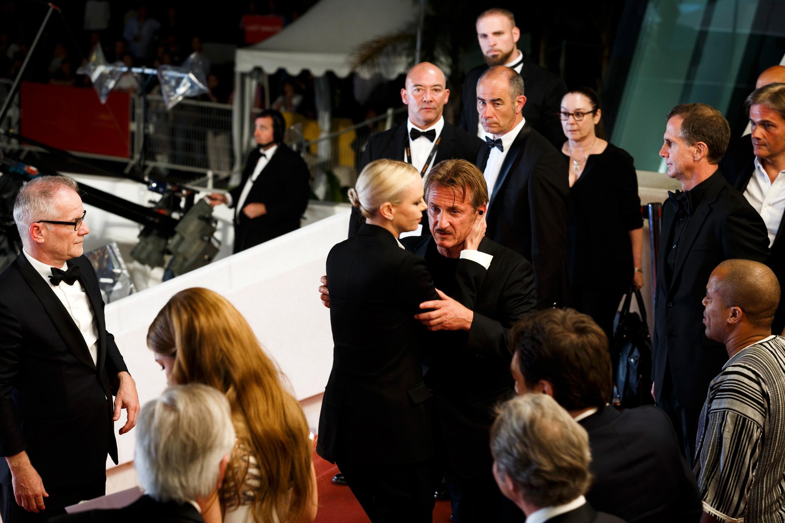 Sean Penn and Charlize Theron embrace at Cannes