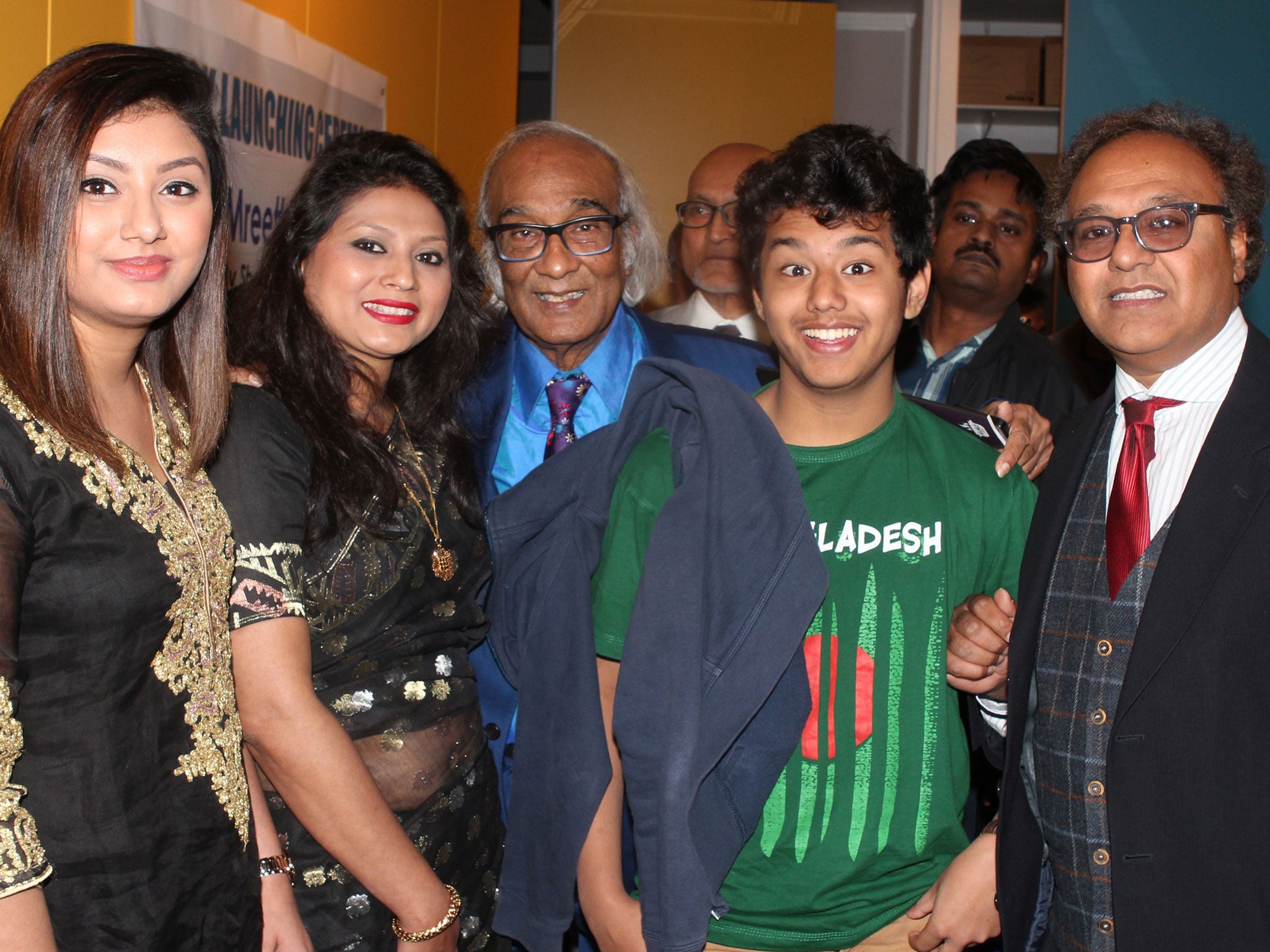 Shafik Rehman (center) pictured in East London last year at his book launch. Also pictured left to right: His granddaughter Prianka, daughter-in-law Bilkis Arzu, grandson Zubeen and son Shumit