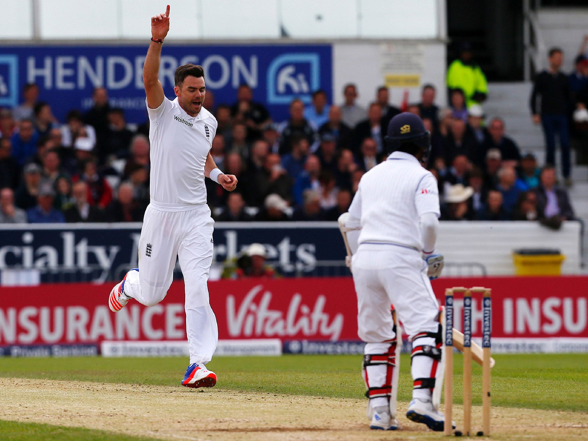 James Anderson celebrates taking the wicket of Koushal Silva on day three