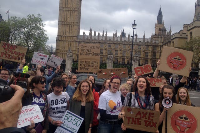 Around 50 people marched through Parliament Square chanting and holding banners in a bid put pressure on the Government to fulfil their pledge to remove the tampon tax