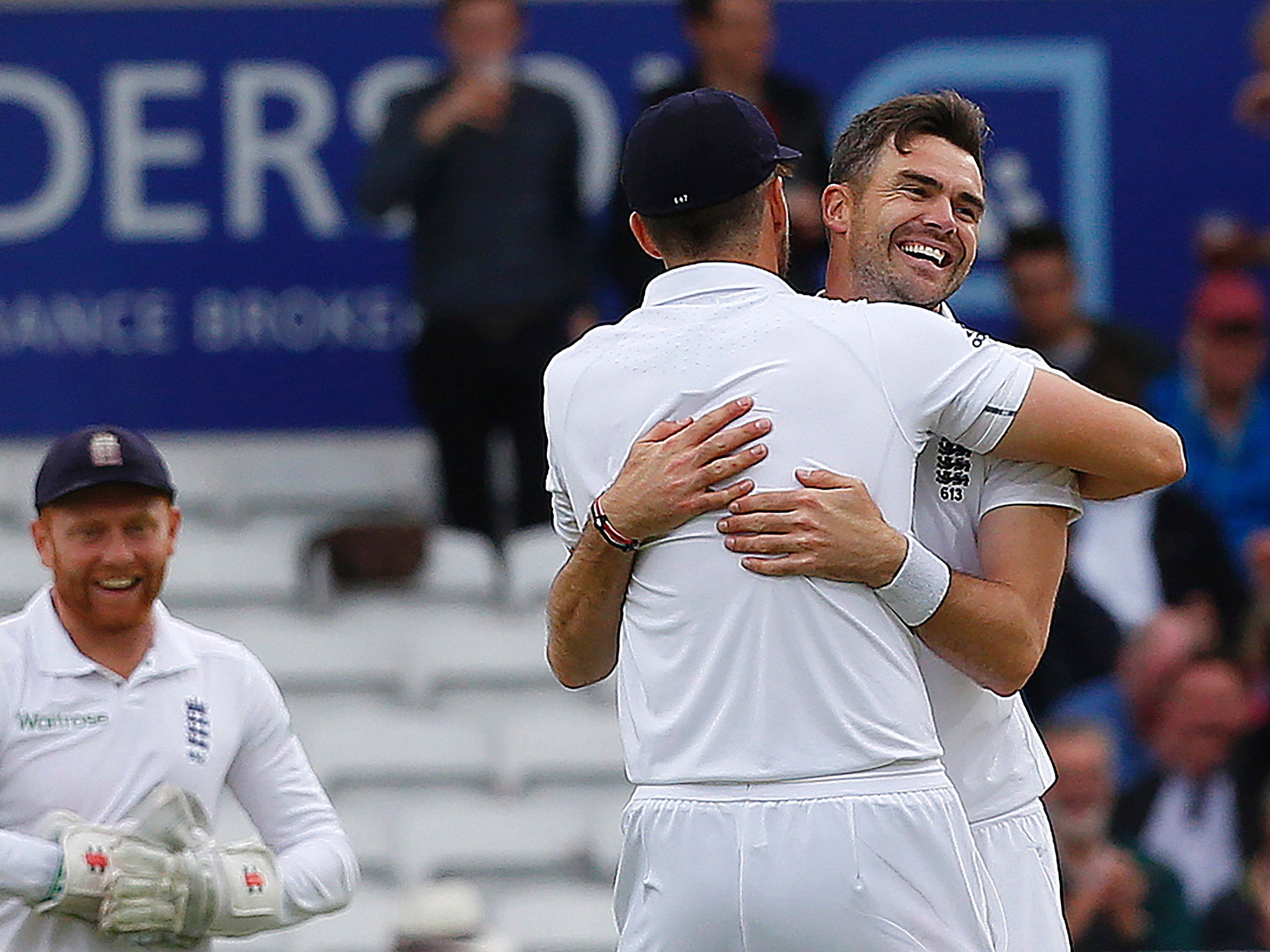 James Anderson embraces Steven Finn after securing victory on the First Test against Sri Lanka