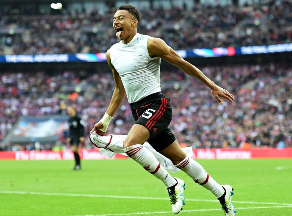 Jesse Lingard celebrates after scoring the winning goal for Manchester United in the FA Cup final