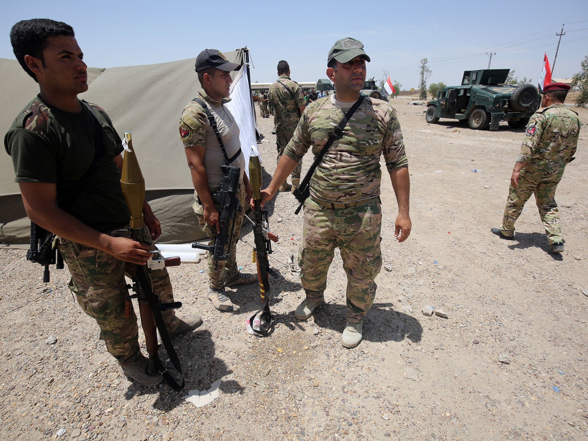 Iraqi security forces gather on the outskirts of Fallujah as they prepare an operation aimed at retaking the city from the Isis, 22 May, 2016