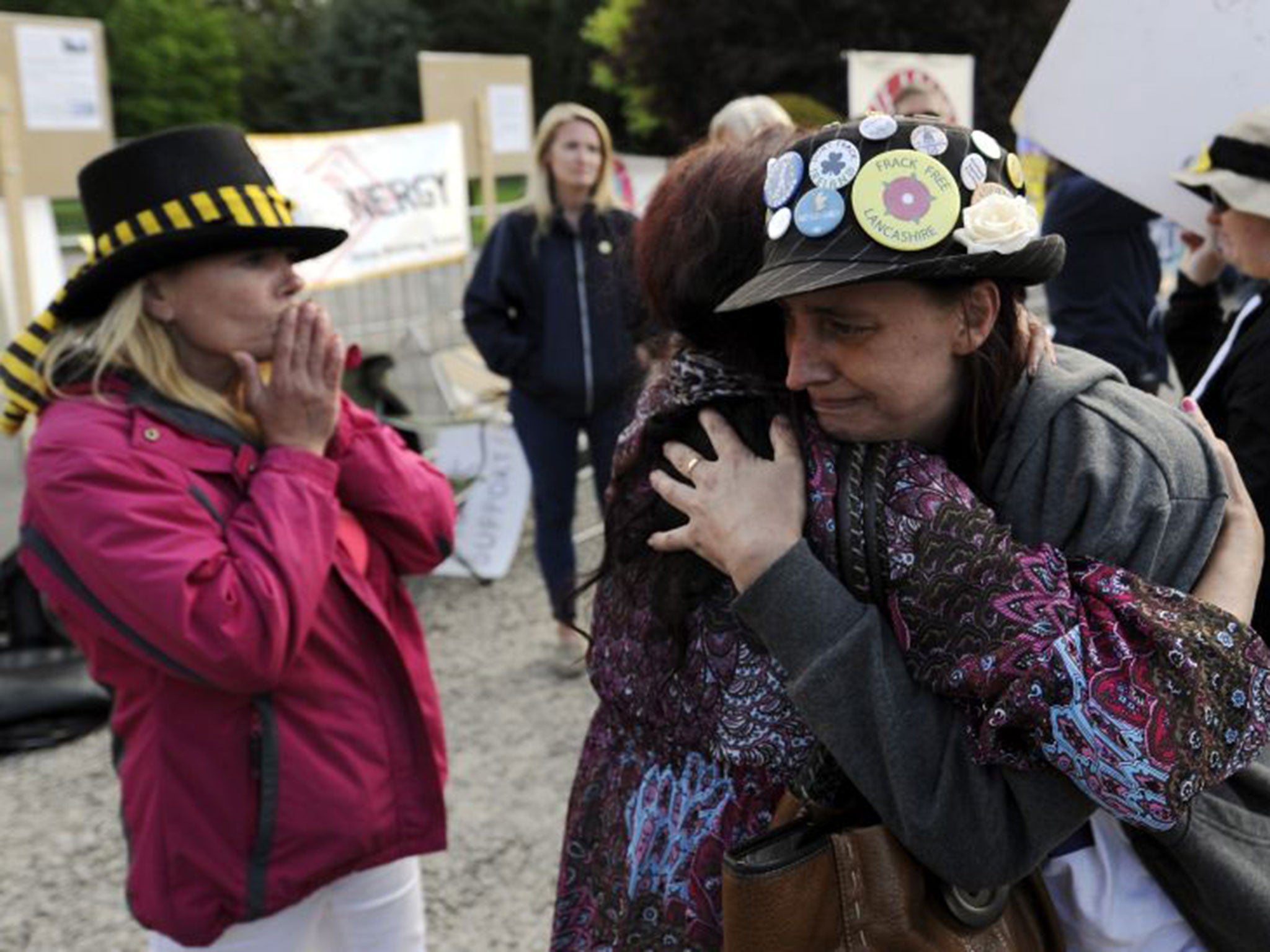 Protesters in Northallerton console one another after councillors approved the application by Third Energy to frack for shale gas in North Yorkshire