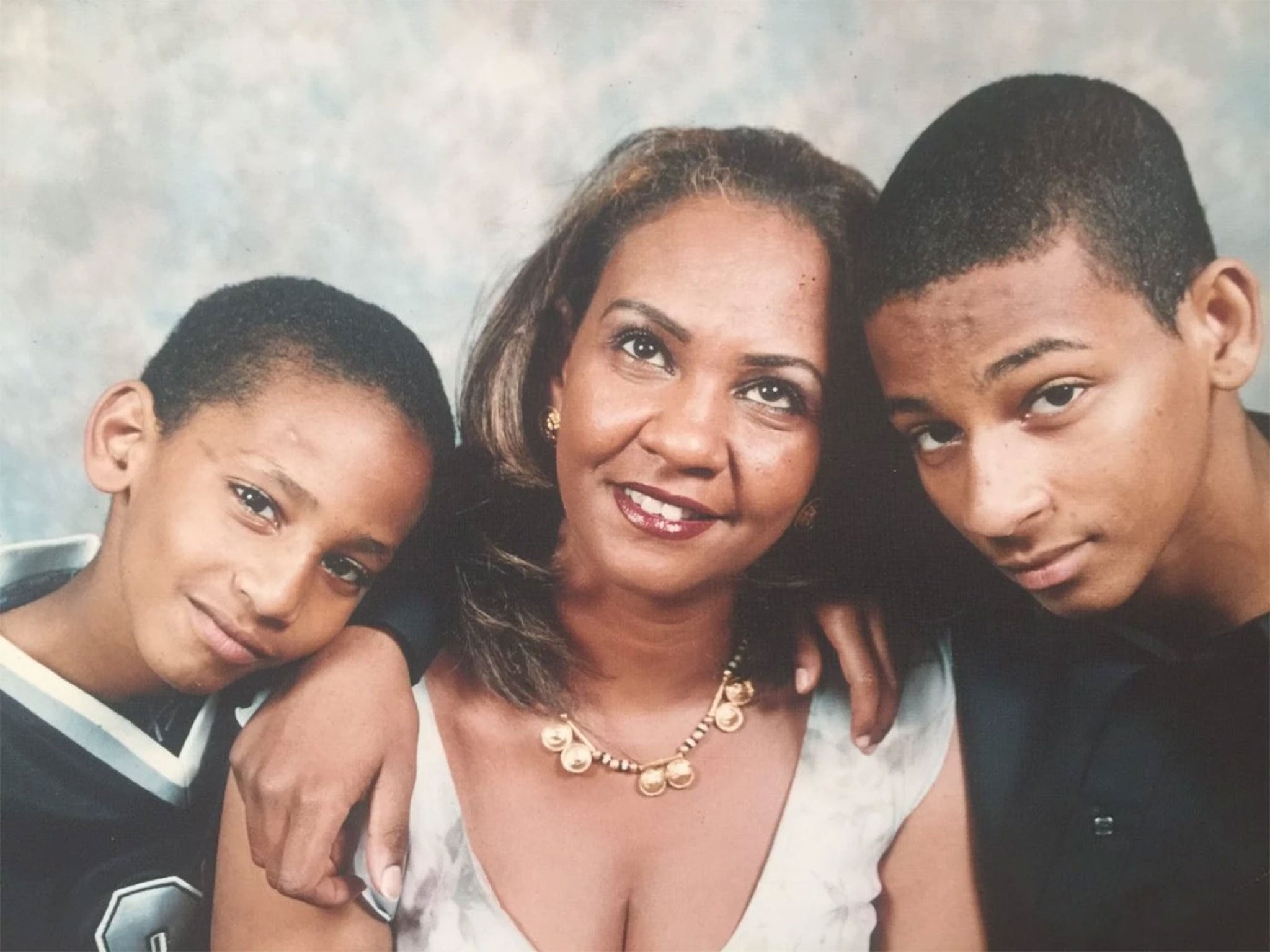 Then-15-year-old El Shafee Elsheikh, right, seen with his mother and younger brother Mahmoud, who was reportedly killed ater also travelling to Syria