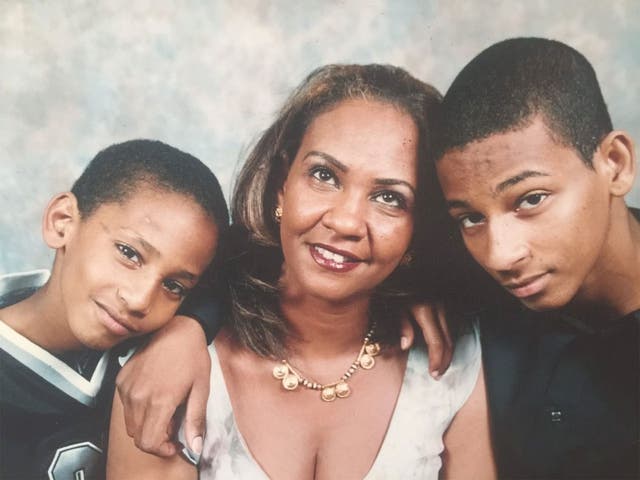 Then-15-year-old El Shafee Elsheikh, right, seen with his mother and younger brother Mahmoud, who was reportedly killed ater also travelling to Syria