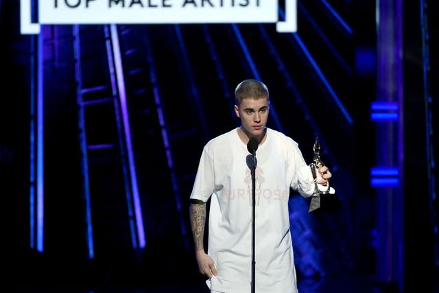 Justin Bieber wins a Billboard award on Sunday evening