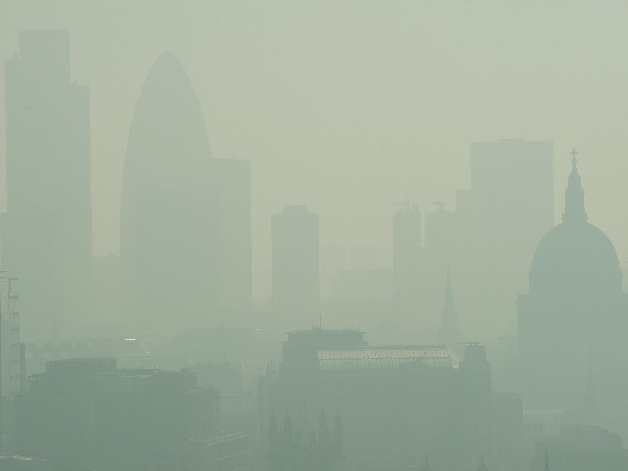 London is barely visible through the smog