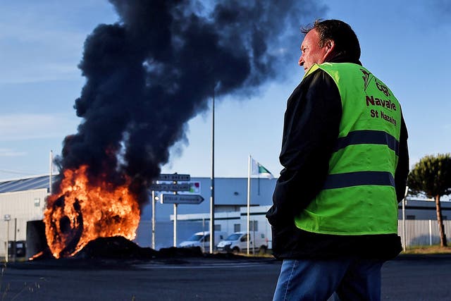 Workers on strike block the access to the harbour of Saint-Nazaire, western France