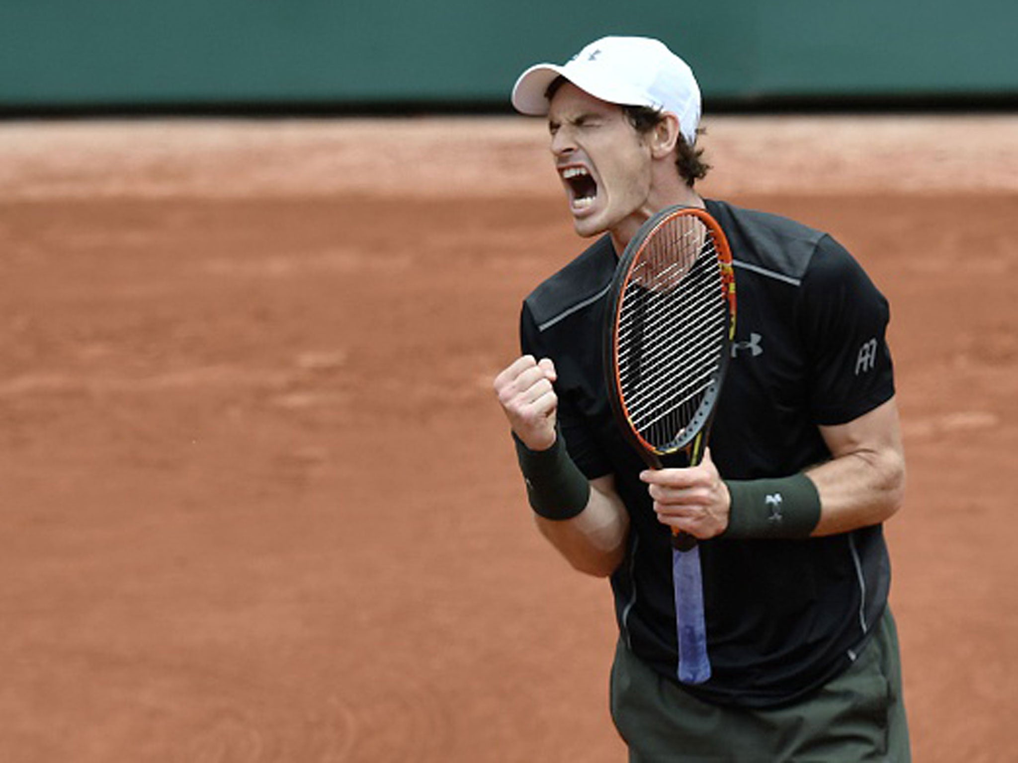 Andy Murray completed his recovery from two sets down to take his place in the second round in Paris (Getty)