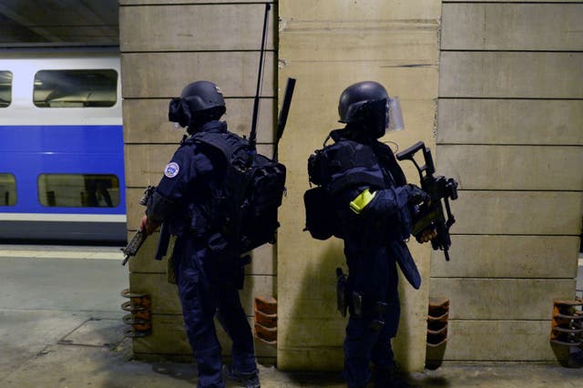 Members of the National Gendarmerie Intervention Group (GIGN) stand in position during a training exercise in the event of a terrorist attack