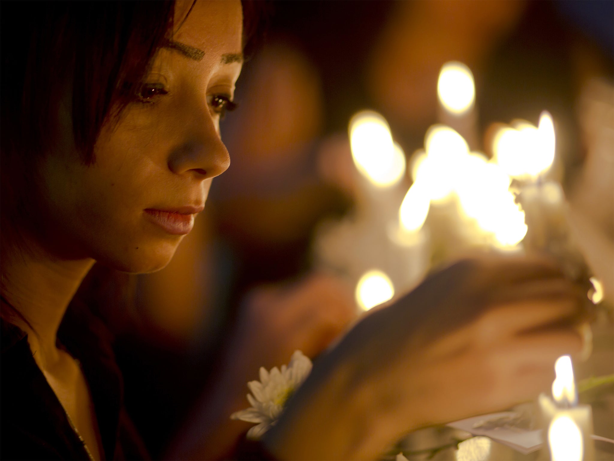 Candles are lit during a vigil for the victims of the crash, in Cairo yesterday