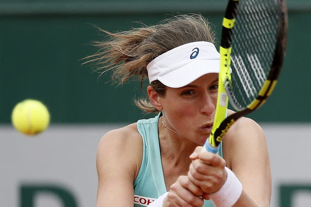 Johanna Konta unleashes a backhand during her defeat to Germany's Julia Goerges
