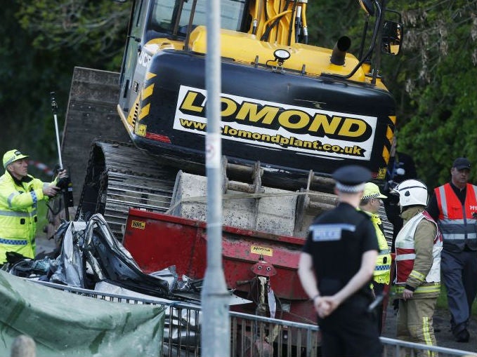 Emergency services at the scene of an accident on Fernhill Road, Glasgow