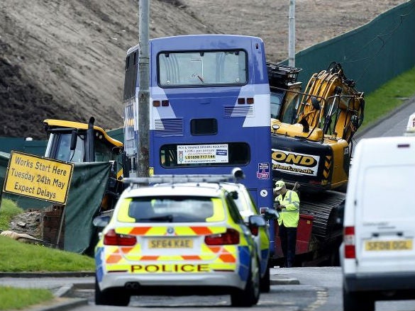 Police at the scene of an accident on Fernhill Road, Glasgow