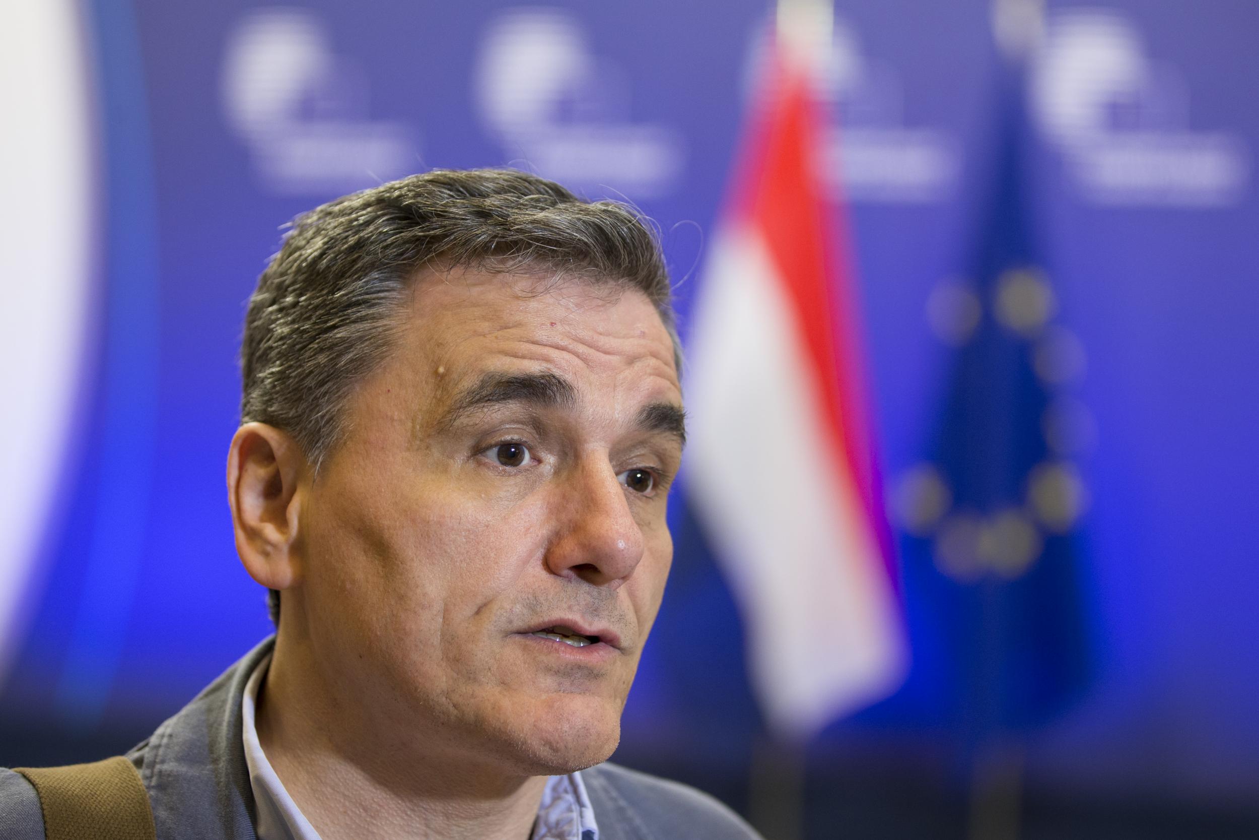 Euclid Tsakalotos, Greece's finance minister, speaks after leaving a Eurogroup meeting of European finance ministers in Brussels, Belgium, on Tuesday
