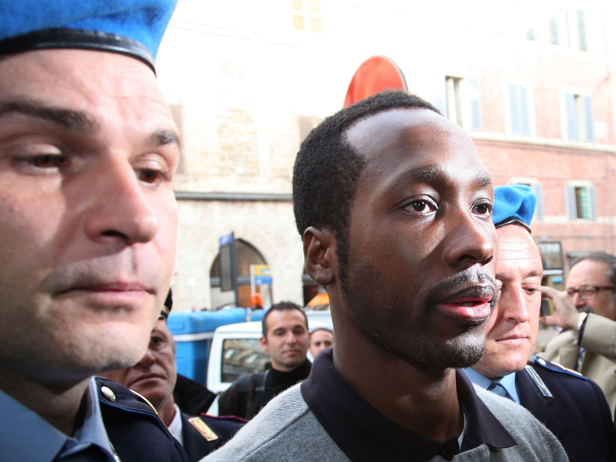 Rudy Guede arrives at the Perugia courthouse for the sitting of his appeal against the sentence he received in the Meredith Kercher murder trial