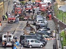 Florence sinkhole: Cars swallowed after stretch of road collapses