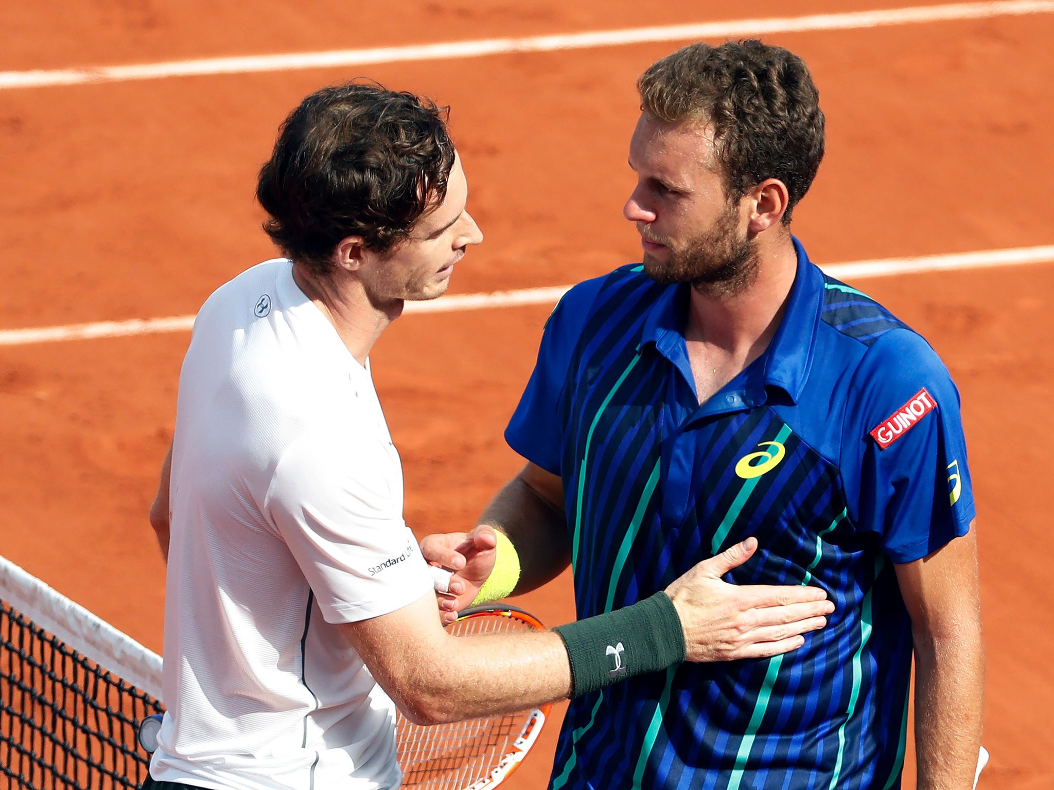 Murray speaks with Bourgue at the end of the match