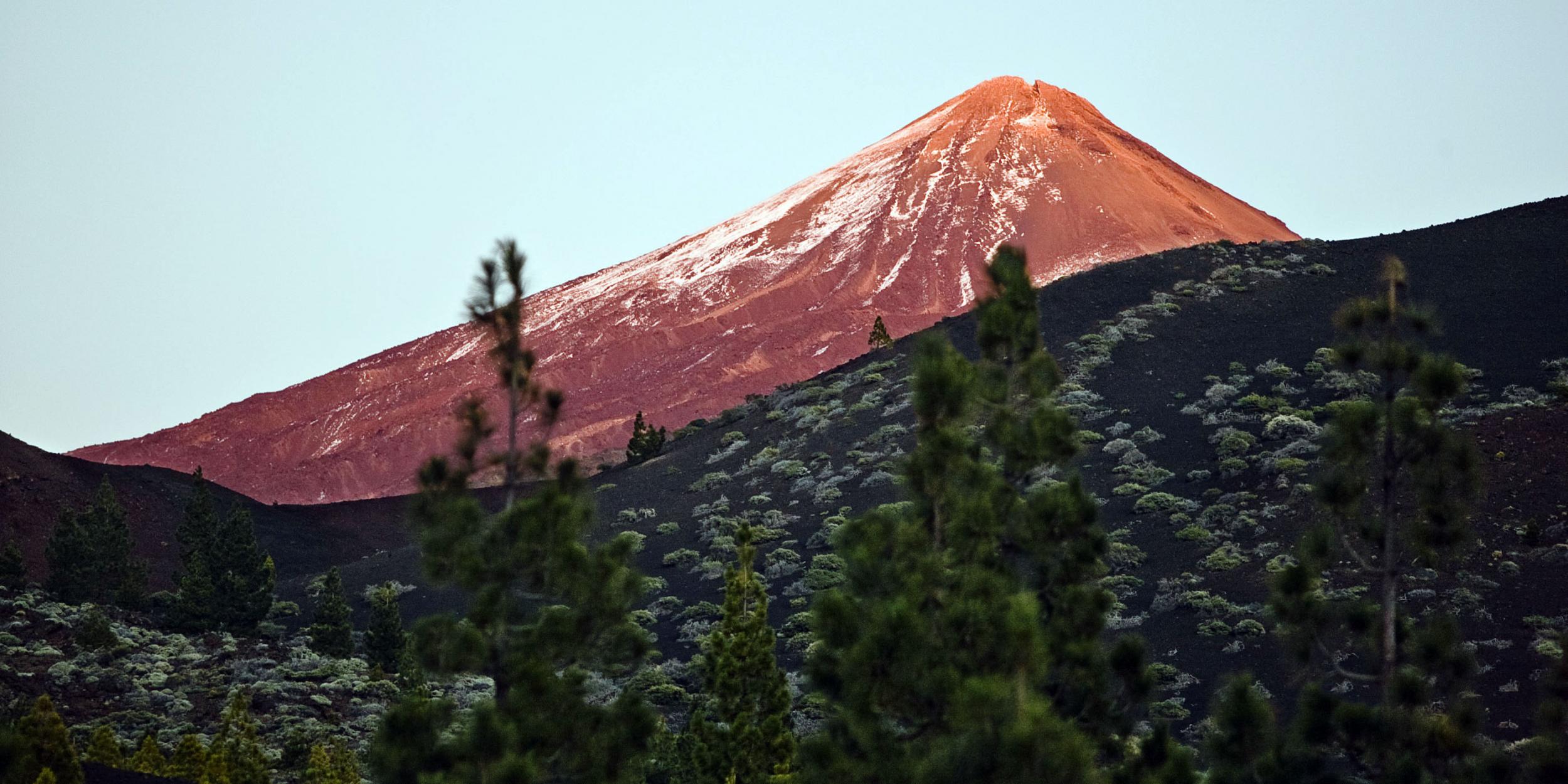 The snow-capped summit of the Pico del Teide volcano at sunset, Teide National Park, Canaries