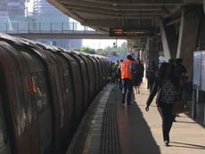 Woman falls in gap between Tube train and platform