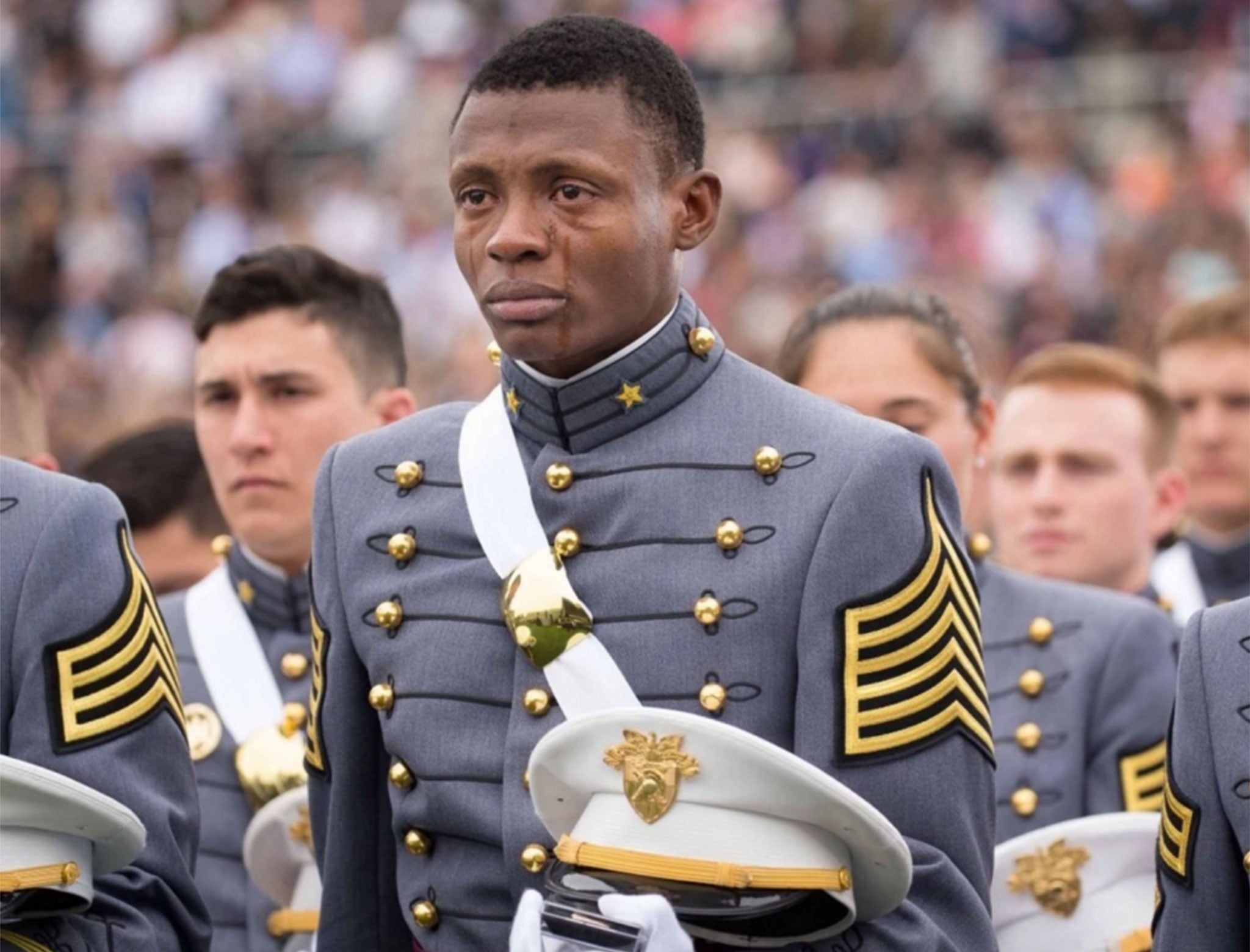 Tears stream down the face of West Point Cadet Alix Idrache during his commencement ceremony at the U.S. Military Academy