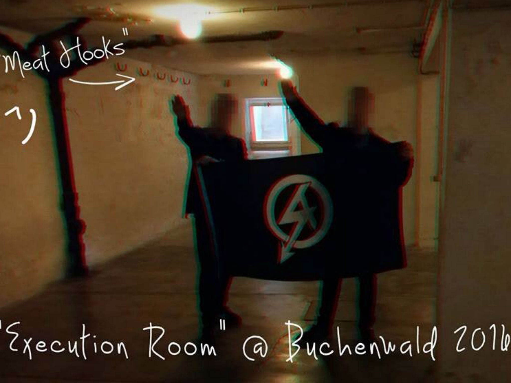 A photo shared online of Alex Davies and Mark Jones performing a Nazi salute inside Buchenwald concentration camp in April 2016