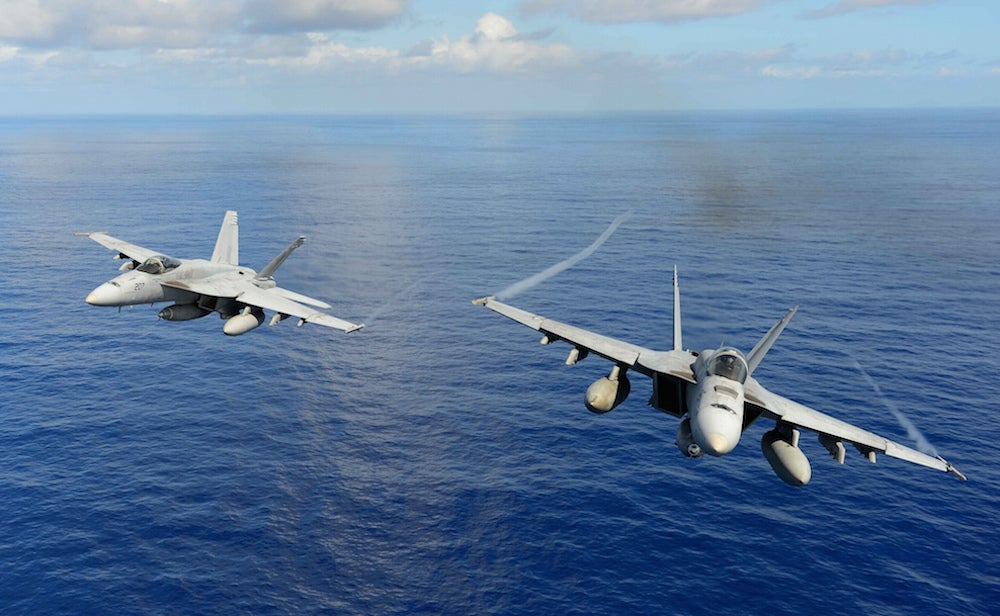 Two F/A-18E Super Hornets perform demonstrations.