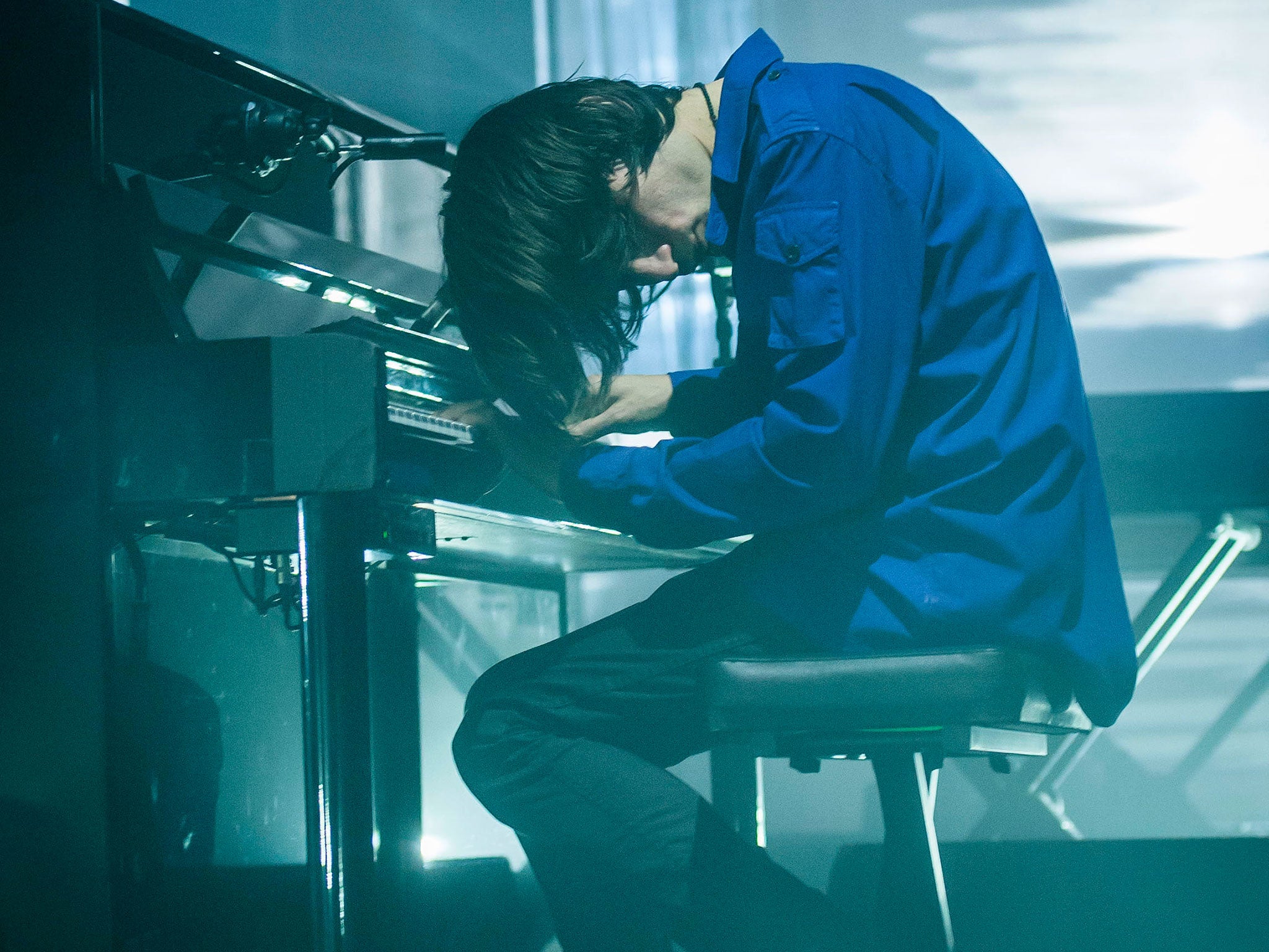 Jonny Greenwood plays piano during Radiohead's Roundhouse show