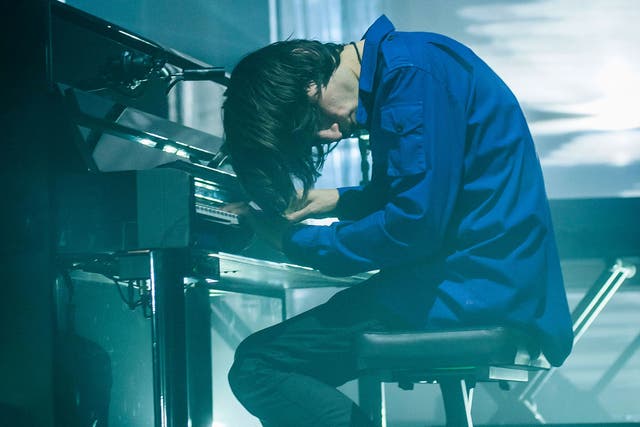 Jonny Greenwood plays piano during Radiohead's Roundhouse show