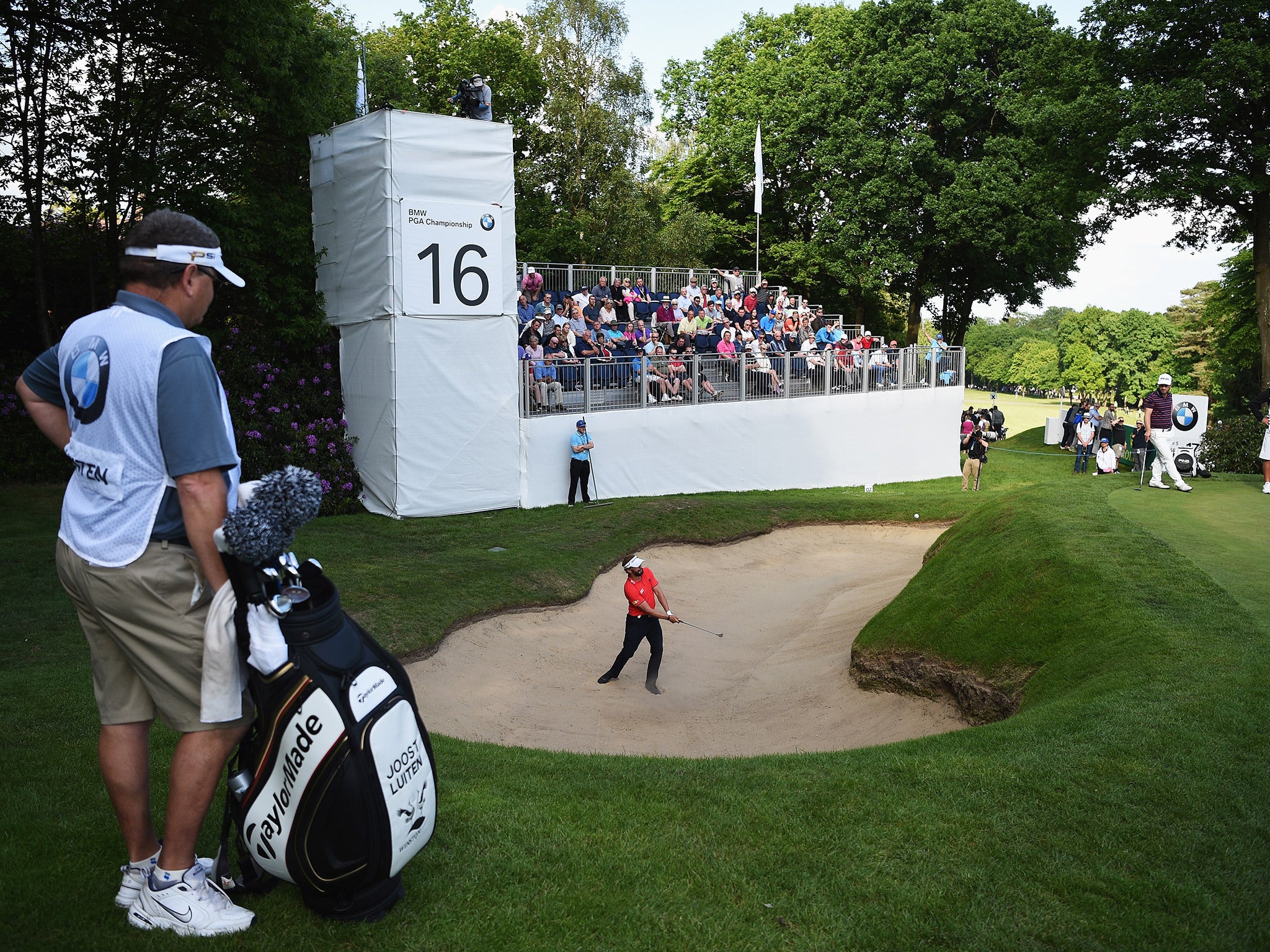 Co-leader Joost Luiten hits out of a bunker