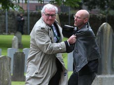 Kevin Vickers: Canadian ambassador who shot Ottowa gunman wrestles with protester at military ceremony honouring British soldiers