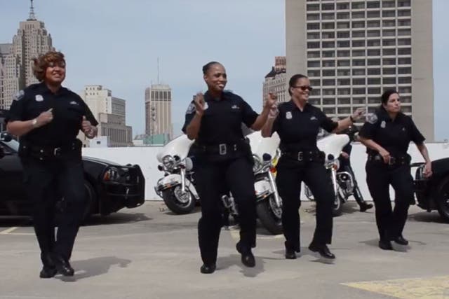 The #RunningMan challenge craze has swept police departments across the US