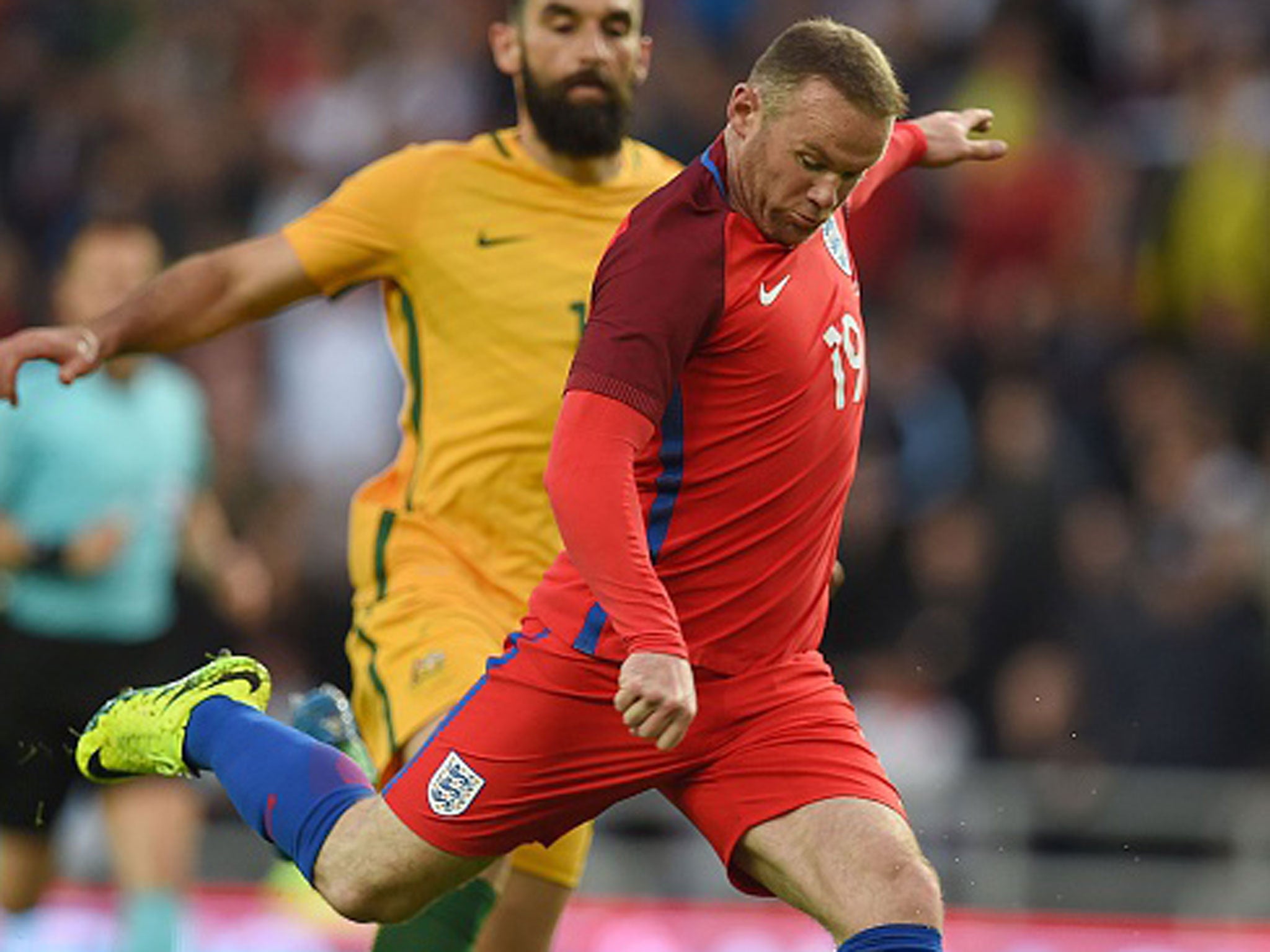 &#13;
Wayne Rooney scored England's second and linked up well with club colleague Marcus Rashford &#13;